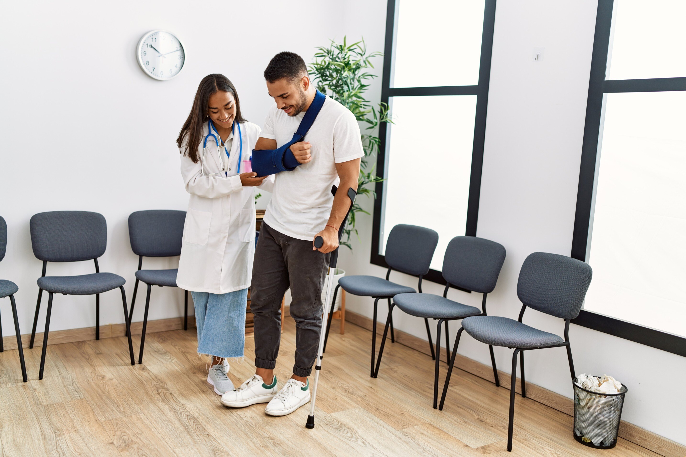 Doctor Assisting Patient - Stock Image